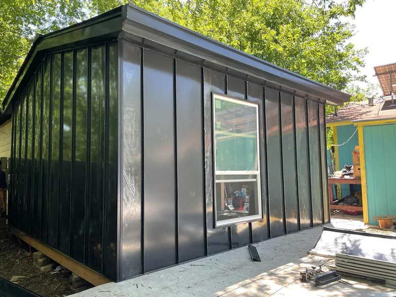 Black standing seam metal wall panels for Metal Roof Installation in West University Place